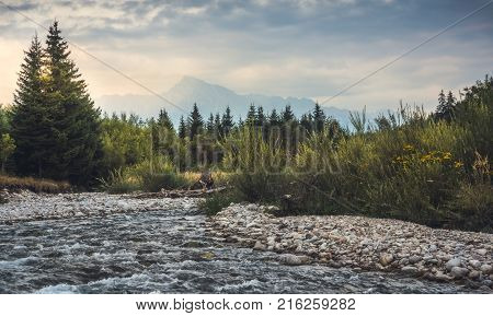 Bela River with Krivan Peak in Background t Sunset in Slovakia