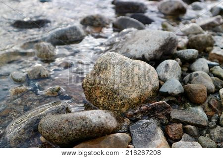 Nature`s own artwork. Here shown as stone at the water`s hedge.