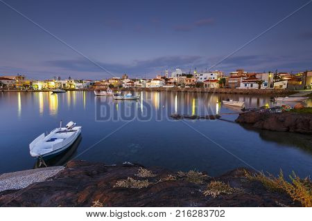 PSARA, GREECE - NOVEMBER 9, 2017: Morning view of Psara village and its harbour on November 9, 2017.