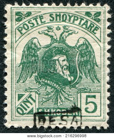 ALBANIA - CIRCA 1922: A stamp printed in the Albania (Shqiperia), depicts an eagle bicapital and ruler of Albania, George Kastrioti Skanderbeg, (overprint BESA), circa 1922