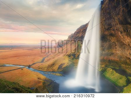 Iceland Waterfall at the sunset time 