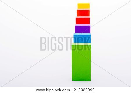 Colorful Domino Blocks In A Line On A White Background