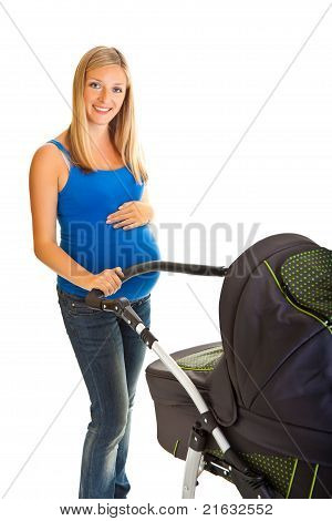 Těhotná žena s dětský kočárek izolované na bílém