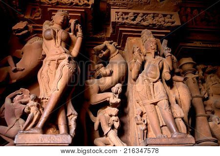 Details of interior of Lakshmana Temple in Khajuraho. Sculptures and relieves with mythological motives of Hinduism