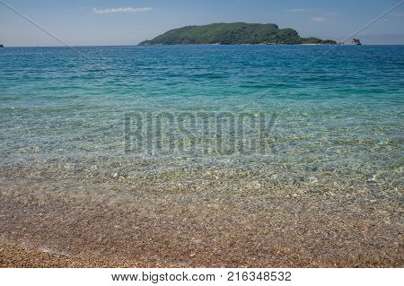 Warm Pebble Beach On The Adriatic Coast.