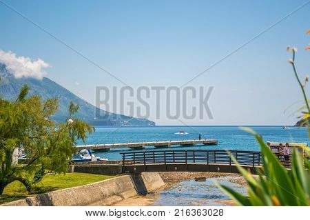Montenegro, Budva - May 30/2017: Tourists Walk Along The Embankment Visiting The Sights.