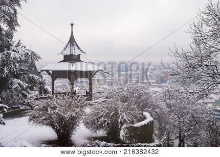 Chinese Pavilion on Schlossberg in town Graz on a foggy winterday