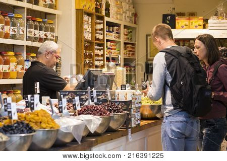 TEL AVIV , ISRAEL - 21 NOVEMBER 2017: Sellers on the old grocery street Nahalat-Benjamin