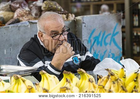 TEL AVIV , ISRAEL - 21 NOVEMBER 2017: Sellers on the old grocery street Nahalat-Benjamin