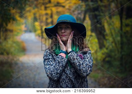 Pretty Romantic Girl In Clothes Walks In A Park. The Mood Of Autumn, Leaf Fall. Autumn Fashion.