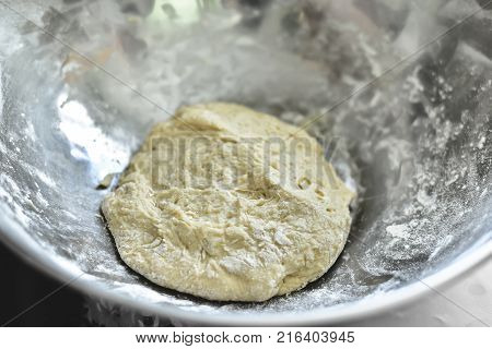 The dough in a bowl, white, cooking