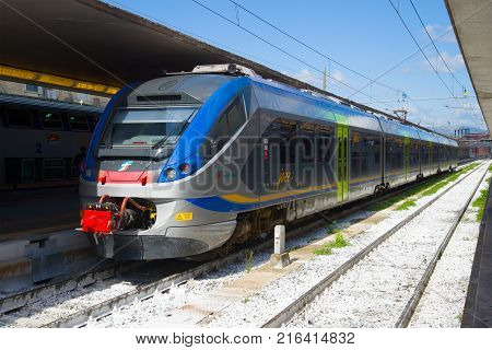 FLORENCE, ITALY - SEPTEMBER 25, 2017: Modern train ETR-425 Trenitalia at the platform of the railway station