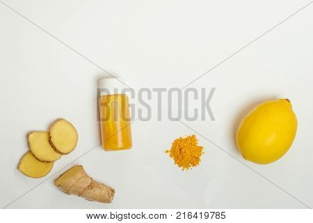 Ginger Shot Healthy Drink With Curd In A Plastic Bottle On White Background. Immunity Boosting Tonic