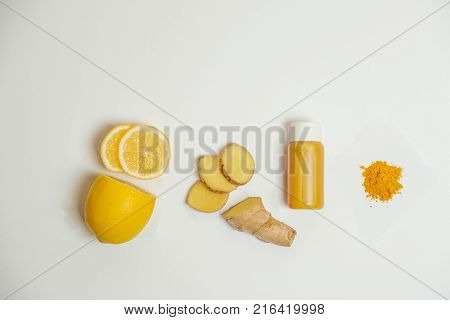 Ginger Shot Healthy Drink With Curd In A Plastic Bottle On White Background. Immunity Boosting Tonic
