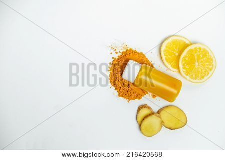 Ginger Shot Healthy Drink With Curd In A Plastic Bottle On White Background. Immunity Boosting Tonic
