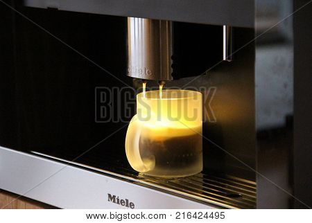 GERMANY - February 2016: Using Miele Built-In Coffee Machines for hot Americano in Germany