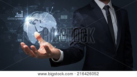 Businessman handing transparent global information flow concept on his hand