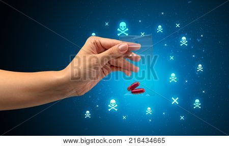 Female handing over pills with skull concept 