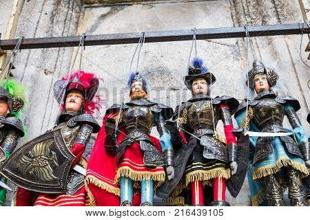Some Sicilian puppets with their typical brassy armor and painted face