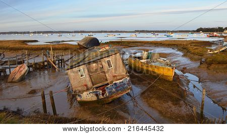 Old Boats on mud flats at Felixstowe Ferry early evening