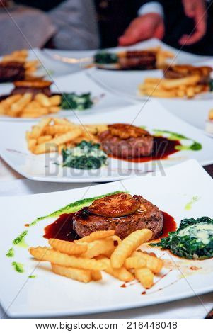 Delicious Grilled Steak on plate in Restaurant Steak