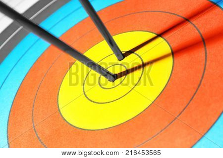 Arrows in the center of target for archery, closeup