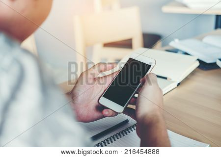 Man Typing Phone Message On Social Network
