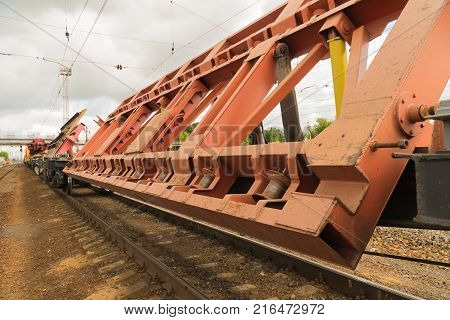 Railway tracklayers ready to lay the rails. Stop before starting work