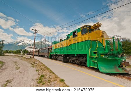 ALASKA - JUNE 2010: Train leaving for excursion to the White Pass taken in Alaska on June 29 2010. The railway was built during the Klondike Gold Rush in 1898.