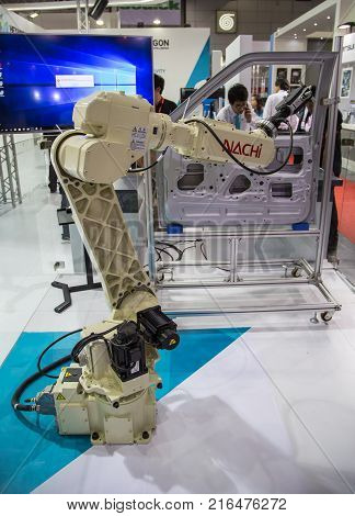 Bangkok Thailand - November 22 2017: Robot arm demonstrate spot welding car door in Metalex 2017
