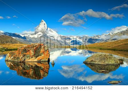Stunning panorama with Matterhorn at morning and beautiful alpine lake, Stellisee, Valais region, Switzerland, Europe
