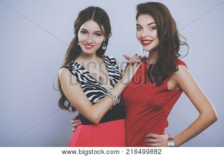 Two young beauty women standing together . Two young beauty wome