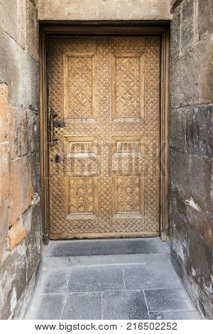 Old door in the Armenian monastery Echmiadzin in Wagharashapat Armenia