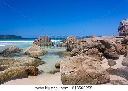 Beautiful shot at Lopes mendes beach, Ilha Grande, Brazil. The rocks and the ocean behind.