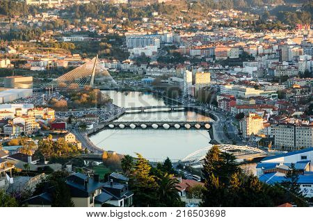 Zoomed view of Lerez river in the city of Pontevedra, in Galicia Spain from an elevated viewpoint. Bridges are Puente de las corrientes, Puente del Burgo, Puente de Santiago, Puente de los tirantes.