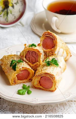 sausages with cheese in lavash for a breackfast. selective focus