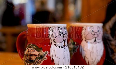 Steaming Cup of Hot Mulled Gluehwein at German Market in British Town.