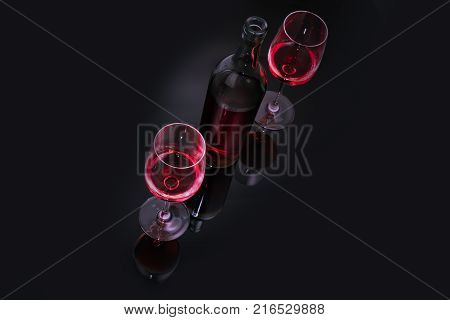 Red wine in glass on black background