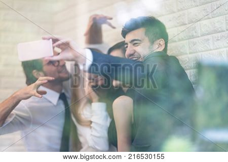 Funny of Active and Young Smart Confident Businessman Doing Selfie.Business Freelanc Co-Working Space Luxurious Serviced Office For Rent Concept.