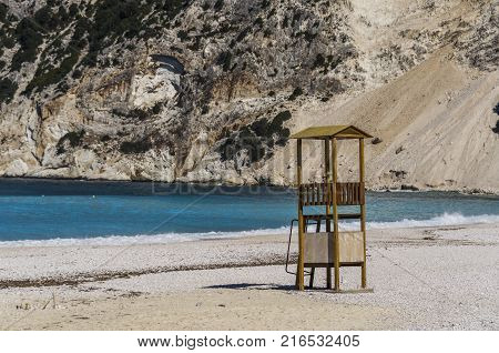 Close-up of lifeguard box turques water and mountain background in Myrtos Beach Kefalonia