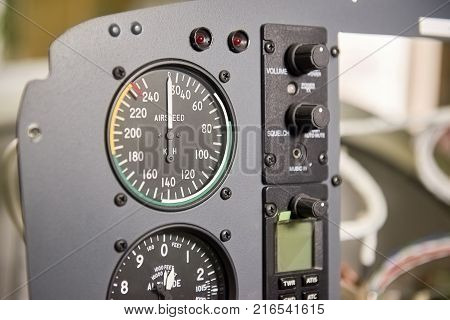Aircraft dashboard macro. Airplane speedometer close up. Airspeed limits and flight safety.
