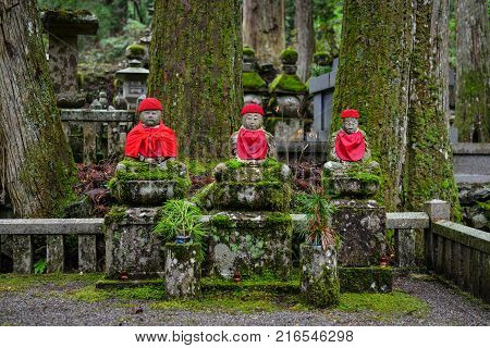 Buddha statues at ancient cemetery on Sacred Mount Koya (Koyasan) in Wakayama Japan.