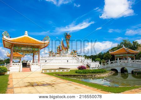Nakornsawan, Thailand. - October 8, 2017 : Beautiful giant or big colorful dragon statue with blue sky at Nakornsawan Park, Thailand.