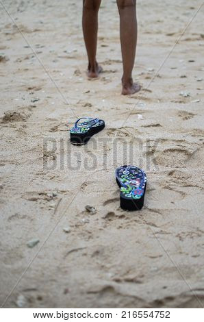 Slippers  or flip flops on the beach