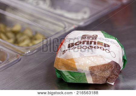 ST. PETERSBURG, RUSSIA - NOVEMBER 29, 2017: Whopper in a kitchen of 500th Burger King restaurant in Russia in the day of opening. First Burger King restaurant opened in Russia in 2010