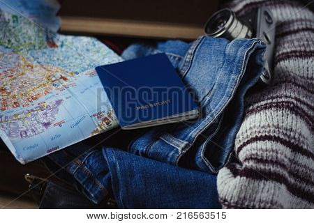 Travel Concept. Female Hand Marks The Spot On The Map. Top View