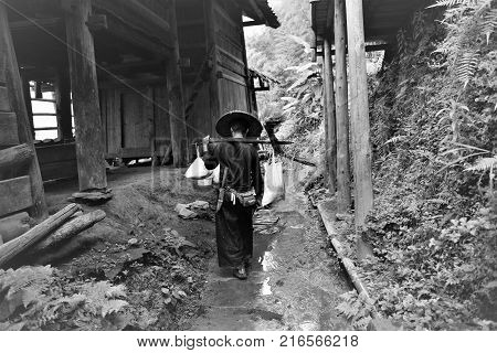 Peolple from different tribes in China dressed in traditional costumes, the miao tribe, dong tribe, gejia people, cormorant fishermen