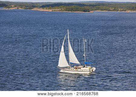 Sailing in Finland coastline. Aland archipelago. Finnish summer sport. Outdoor