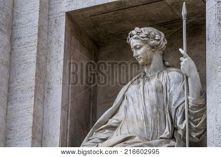 Statue representing the Salubrity in the Trevi Fountain in Rome, Detail of one of the statues 