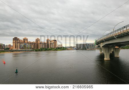 A New District In St. Petersburg. River, Bridge, New Building.